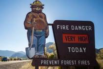 A U.S. Forest Service sign indicating the level of fire risk on Kyle Canyon Road at Mount Charl ...