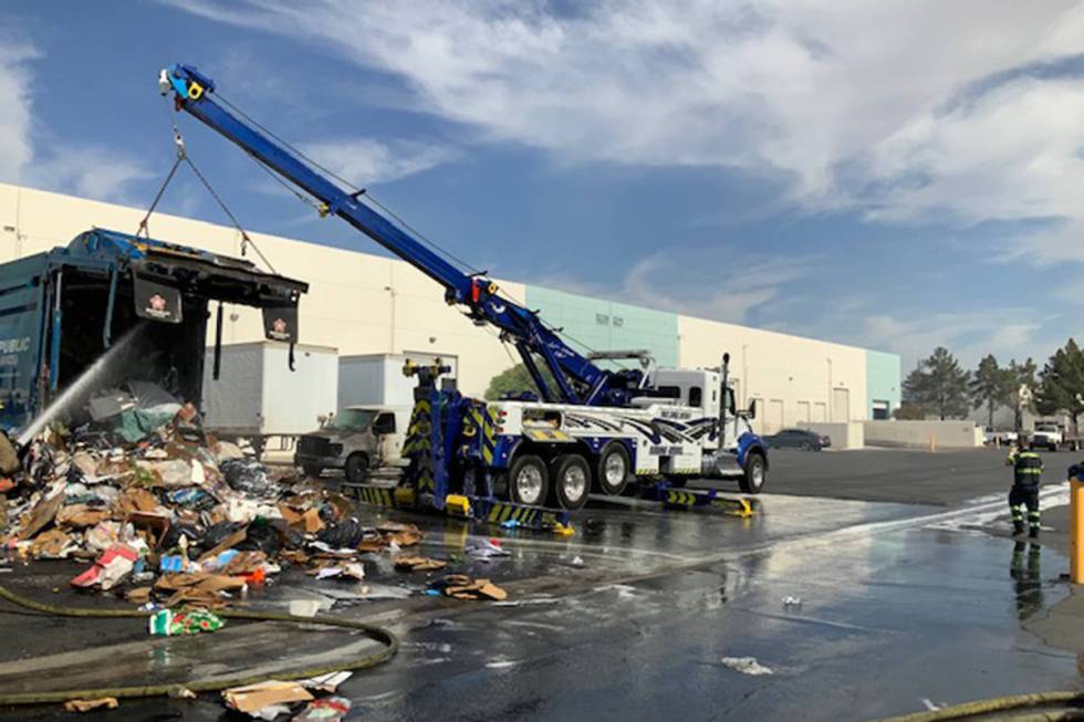 Crews battle a truck fire Wednesday, May 19, 2021, at 3210 E. Charleston Blvd. in Las Vegas. (L ...