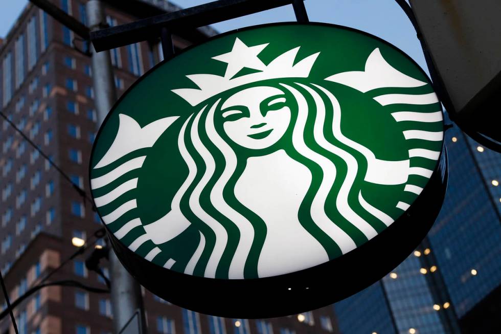 This file photo shows a Starbucks sign outside a Starbucks coffee shop in downtown Pittsburgh. ...