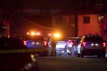 Metropolitan police investigate a homicide near the intersection of Marlin Avenue and 14th Stre ...