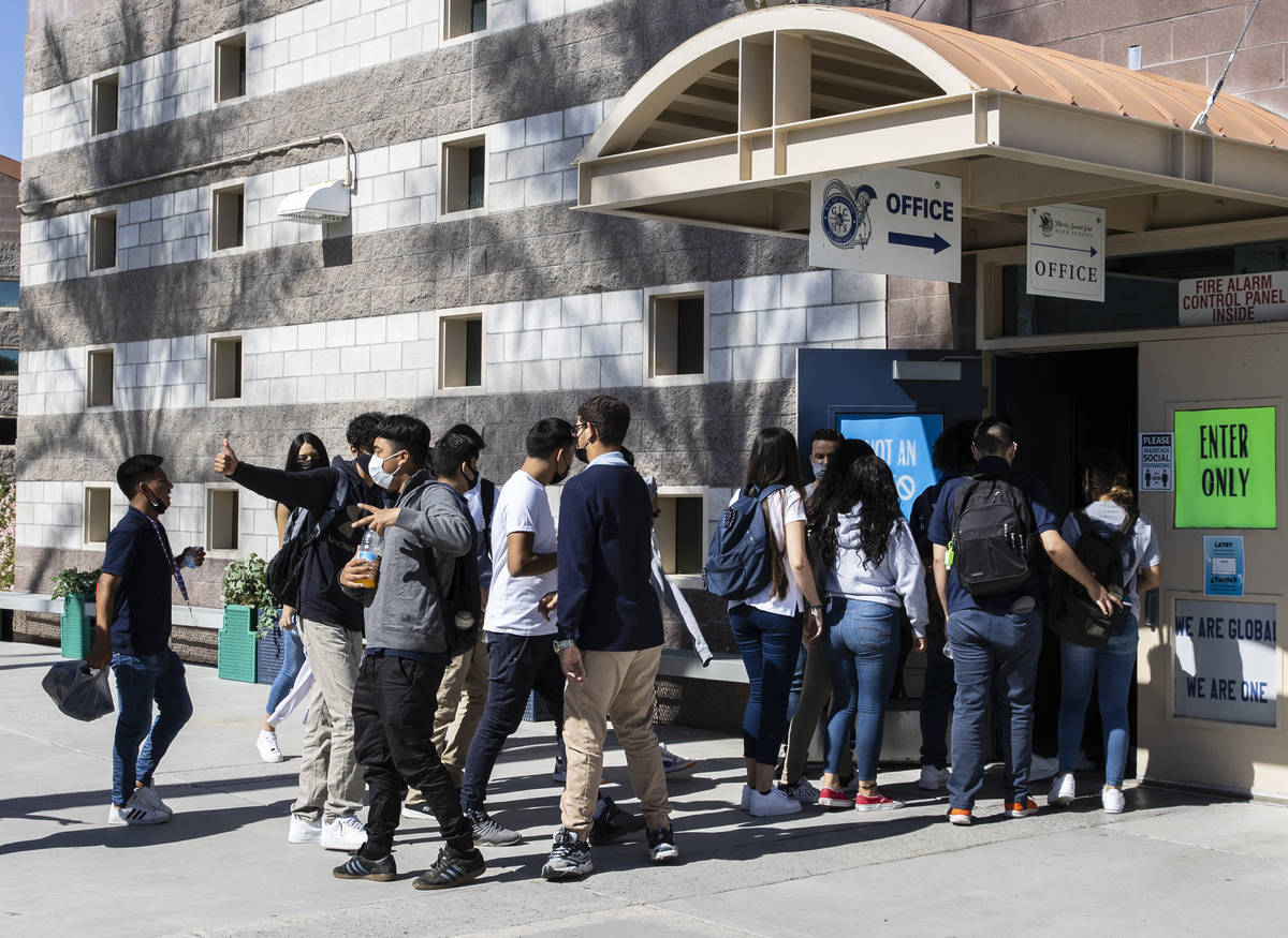 Students enter Global Community High School, on Tuesday, May, 18, 2021, in Las Vegas. (Bizuayeh ...