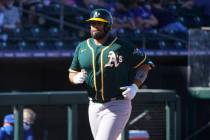 Oakland Athletics' Francisco Pena runs to home plate with a home run in the sixth inning of a s ...