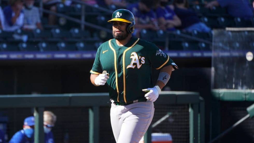 Oakland Athletics' Francisco Pena runs to home plate with a home run in the sixth inning of a s ...