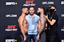 Rob Font, left, and Cody Garbrandt face off during the UFC Fight Night weigh-in at UFC APEX on ...