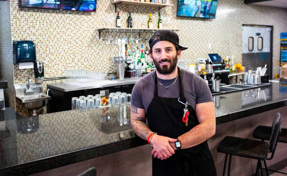 Matthew Meyer, owner and chef at Served Global Cuisine, poses for a portrait in the new sushi b ...