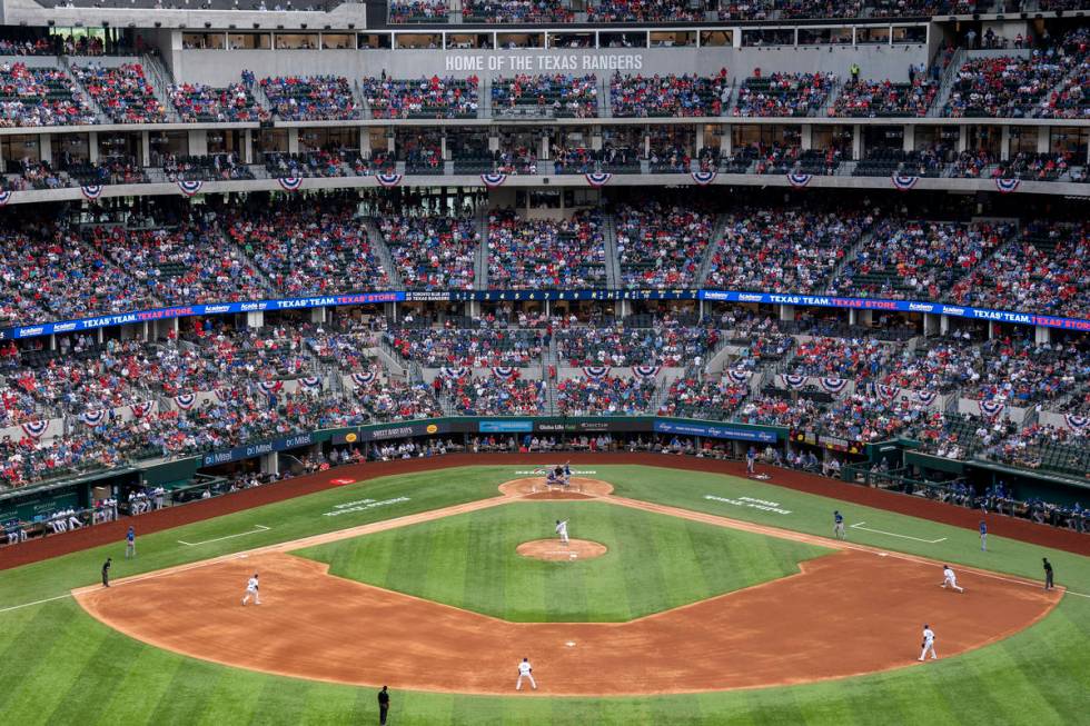 Fans fill the stands at Globe Life Field during the second inning of a baseball game between th ...