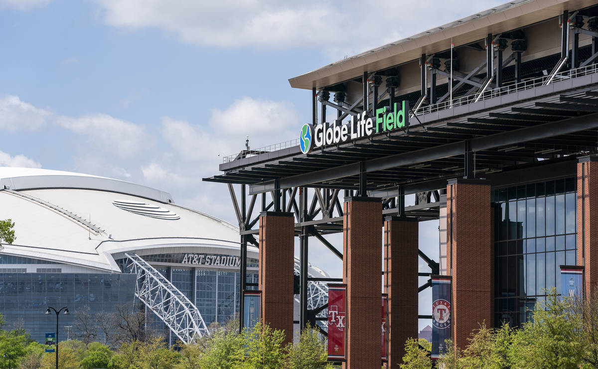 The facade of Globe Life Field stands in front of the Dallas Cowboys' AT&T Stadium before a ...