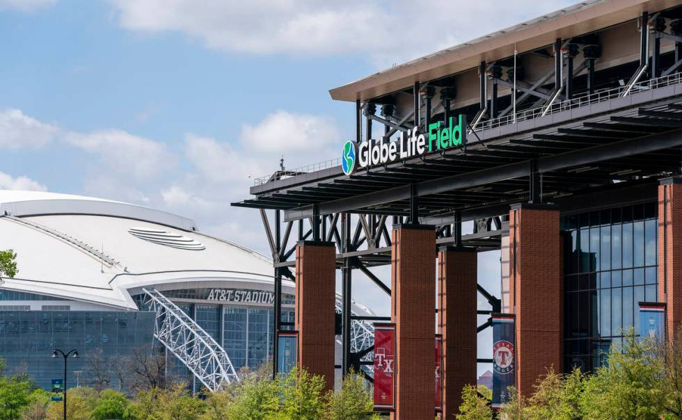 The facade of Globe Life Field stands in front of the Dallas Cowboys' AT&T Stadium before a ...