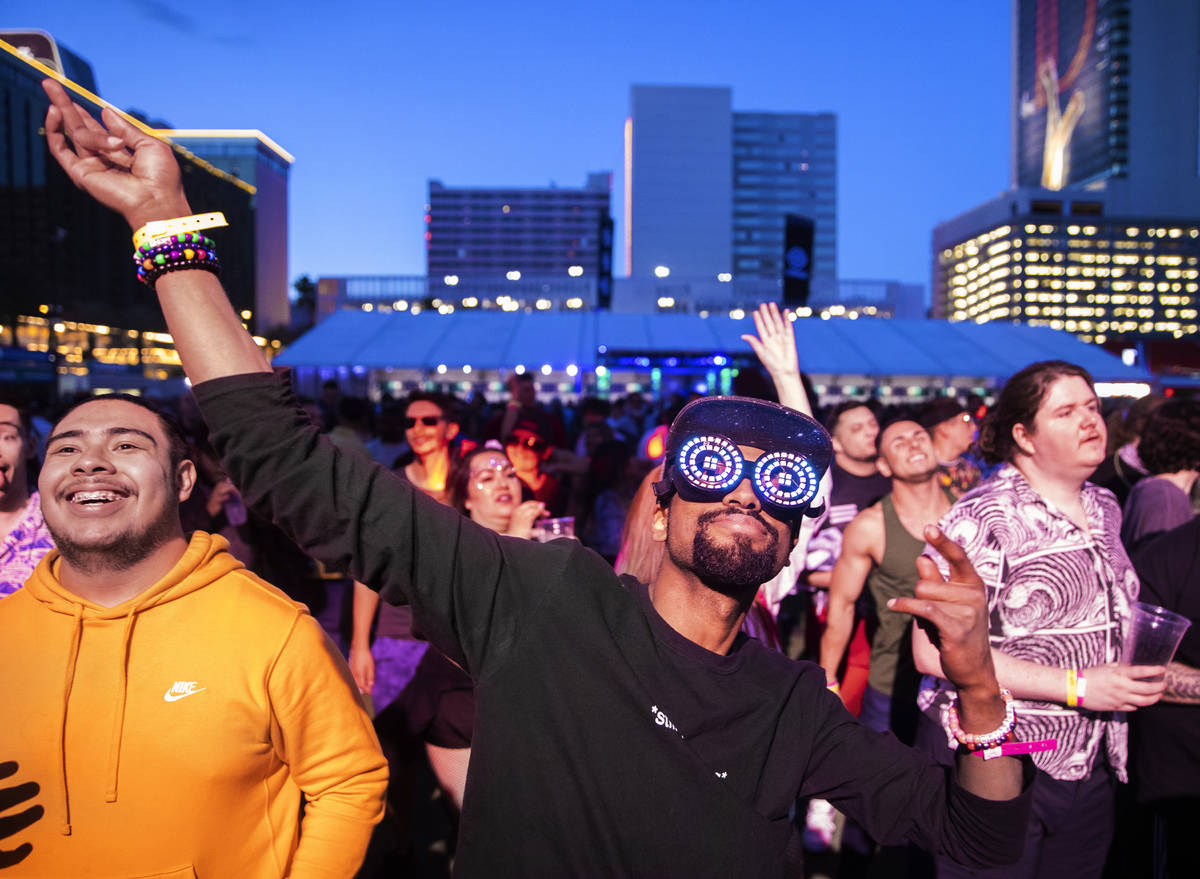 Jahi Cooke dances in a large crowd during Insomniac presents Deadmau5 at The Downtown Las Vegas ...