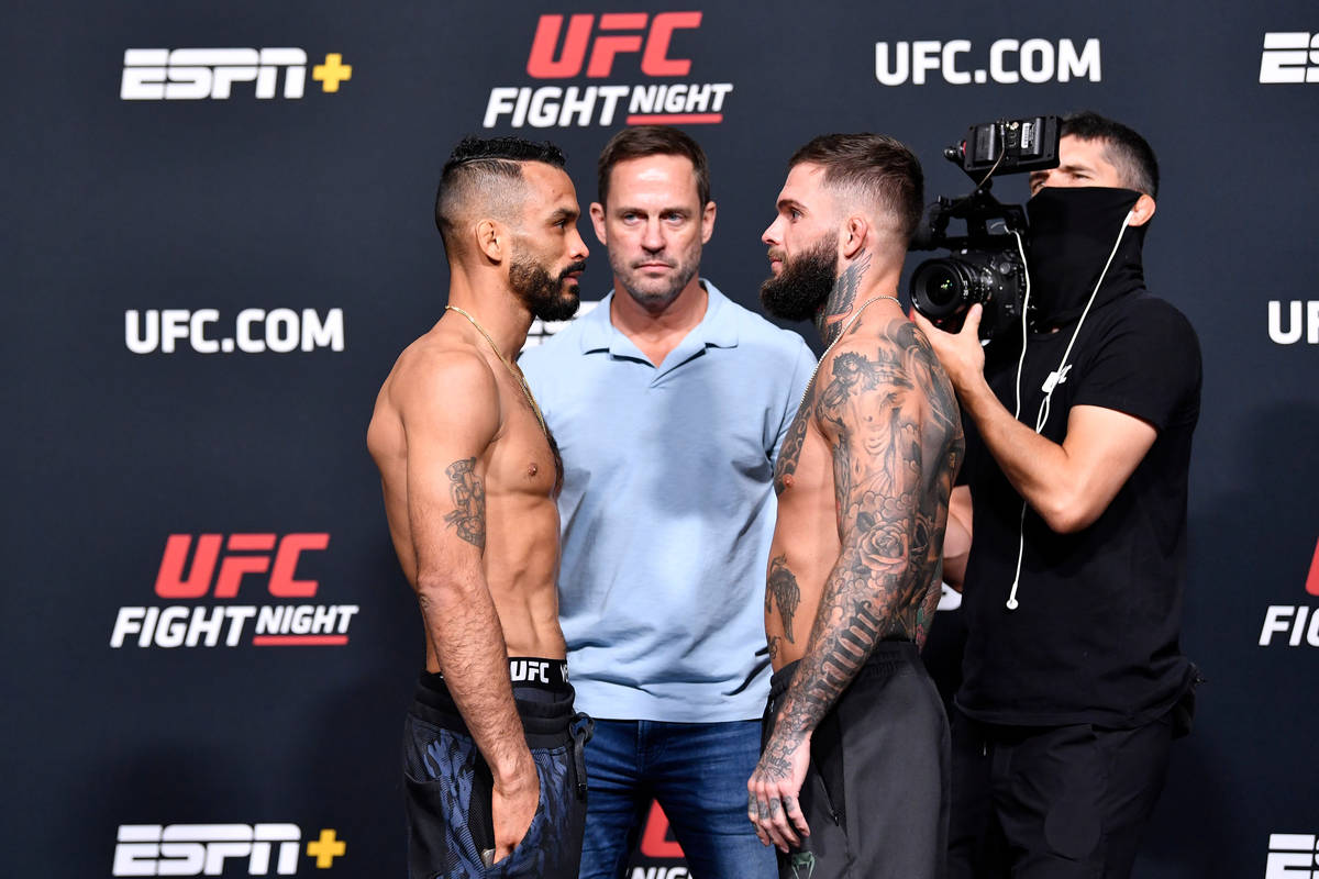 Rob Font and Cody Garbrandt face off during the UFC Fight Night weigh-in at UFC APEX on May 21, ...