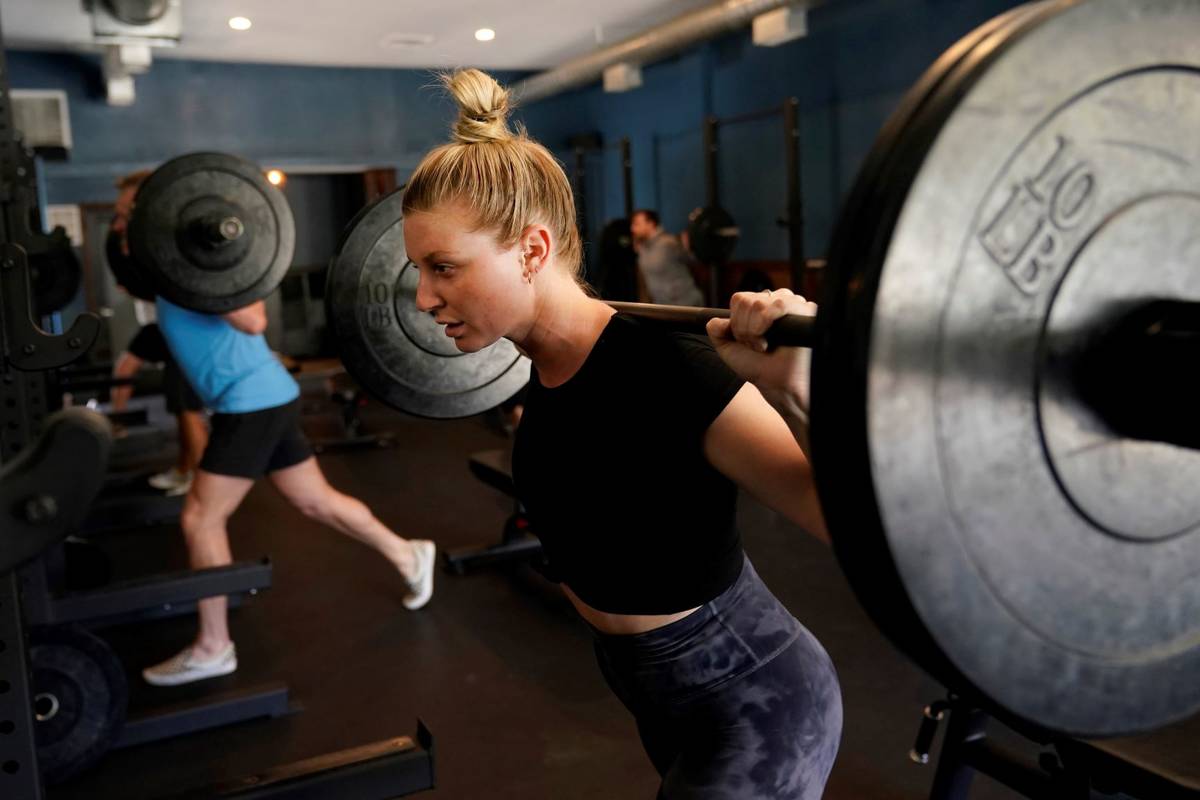 Claire Wilcox participates in a fitness class at Lift Society Friday, May 21, 2021, in Studio C ...