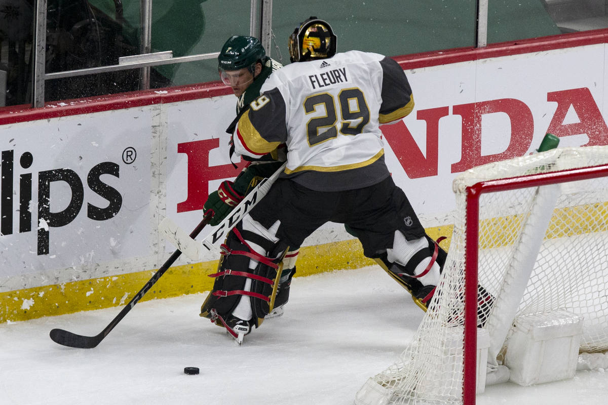 Vegas Golden Knights goaltender Marc-Andre Fleury (29) plays behind the net against Minnesota W ...