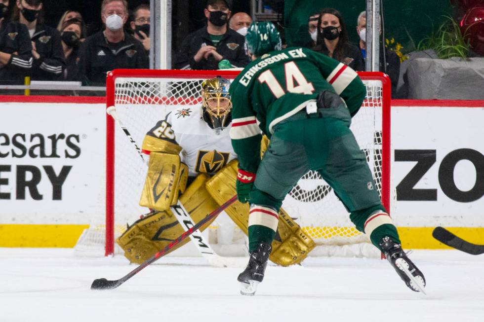 Vegas Golden Knights goaltender Marc-Andre Fleury (29) watches Minnesota Wild center Joel Eriks ...