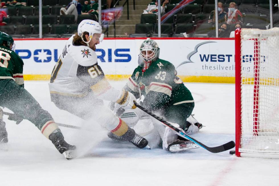 Vegas Golden Knights right wing Mark Stone (61) scores a goal against Minnesota Wild goaltender ...