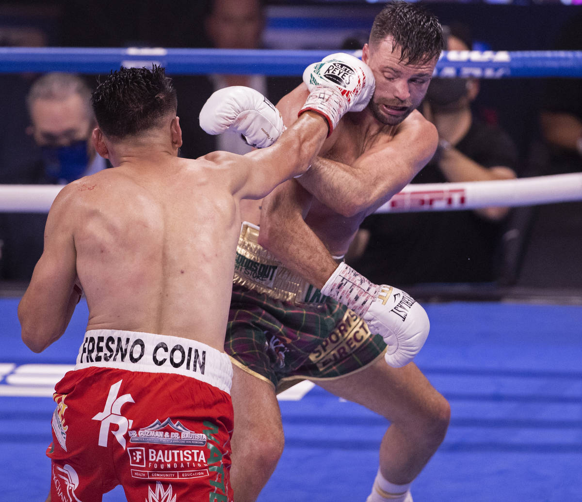 Josh Taylor, right, gets hit by JosŽ Ram’rez during the 5th round of their junior ...