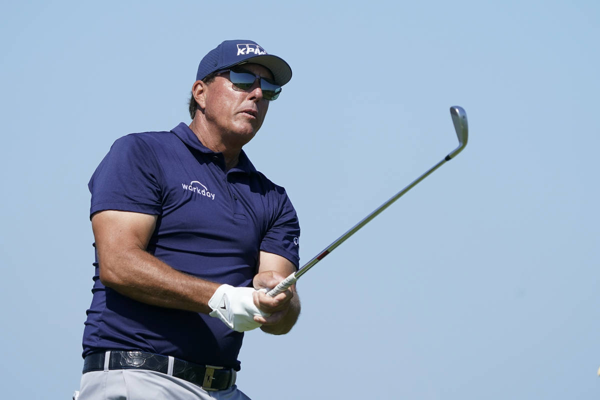 Phil Mickelson watches his shot off the fifth tee during the final round at the PGA Championshi ...