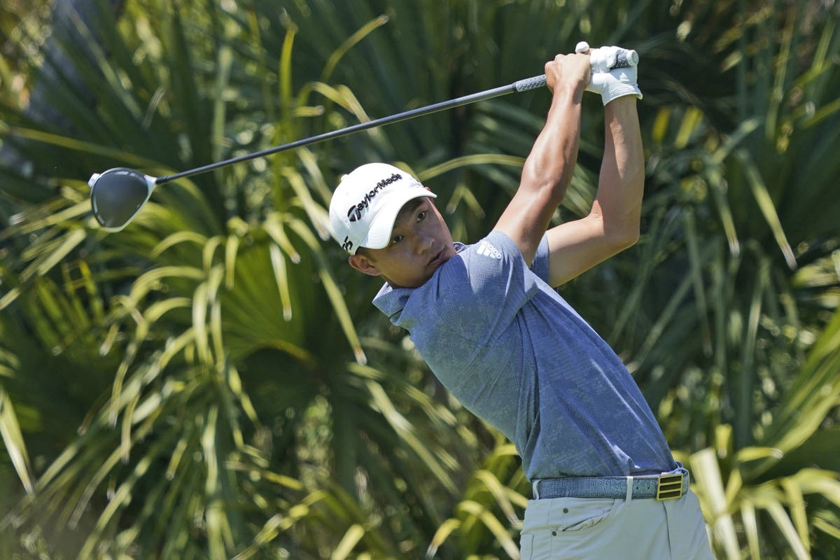Collin Morikawa hits his tee shot on the 15th tee during the first round of the PGA Championshi ...