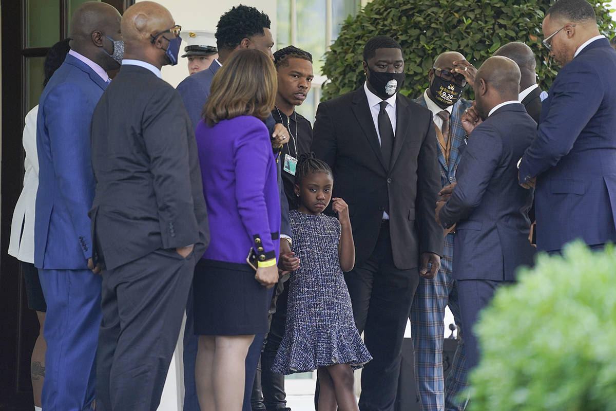 Members of the George Floyd family, including Floyd's daughter Gianna, center, talk outside the ...