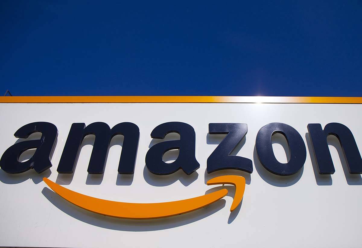 In this April 16, 2020, file photo, the Amazon logo is displayed in Douai, northern France. Am ...