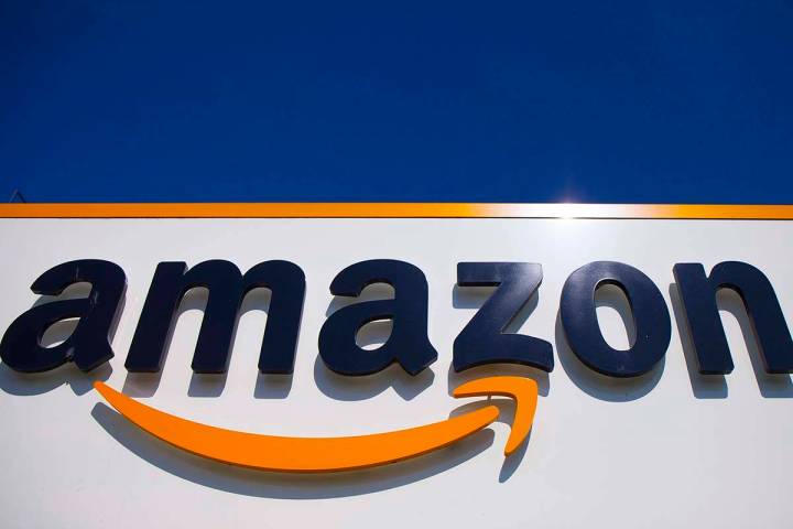 In this April 16, 2020, file photo, the Amazon logo is displayed in Douai, northern France. Am ...