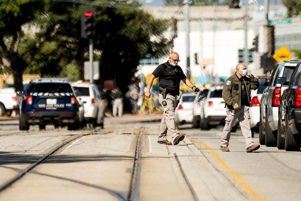 Law enforcement officers respond to the scene of a shooting at a Santa Clara Valley Transportat ...