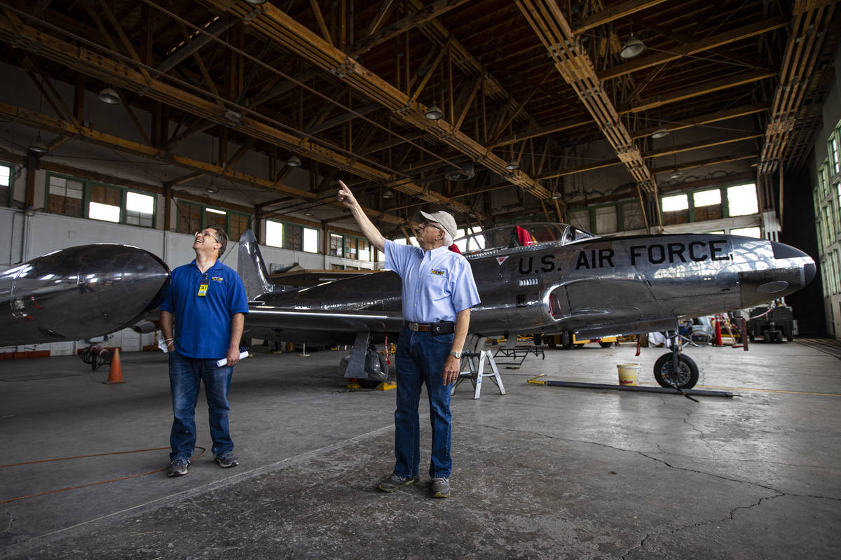 Jim Petersen, president and founder of the Historic Wendover Airfield Foundation, right, lead a ...