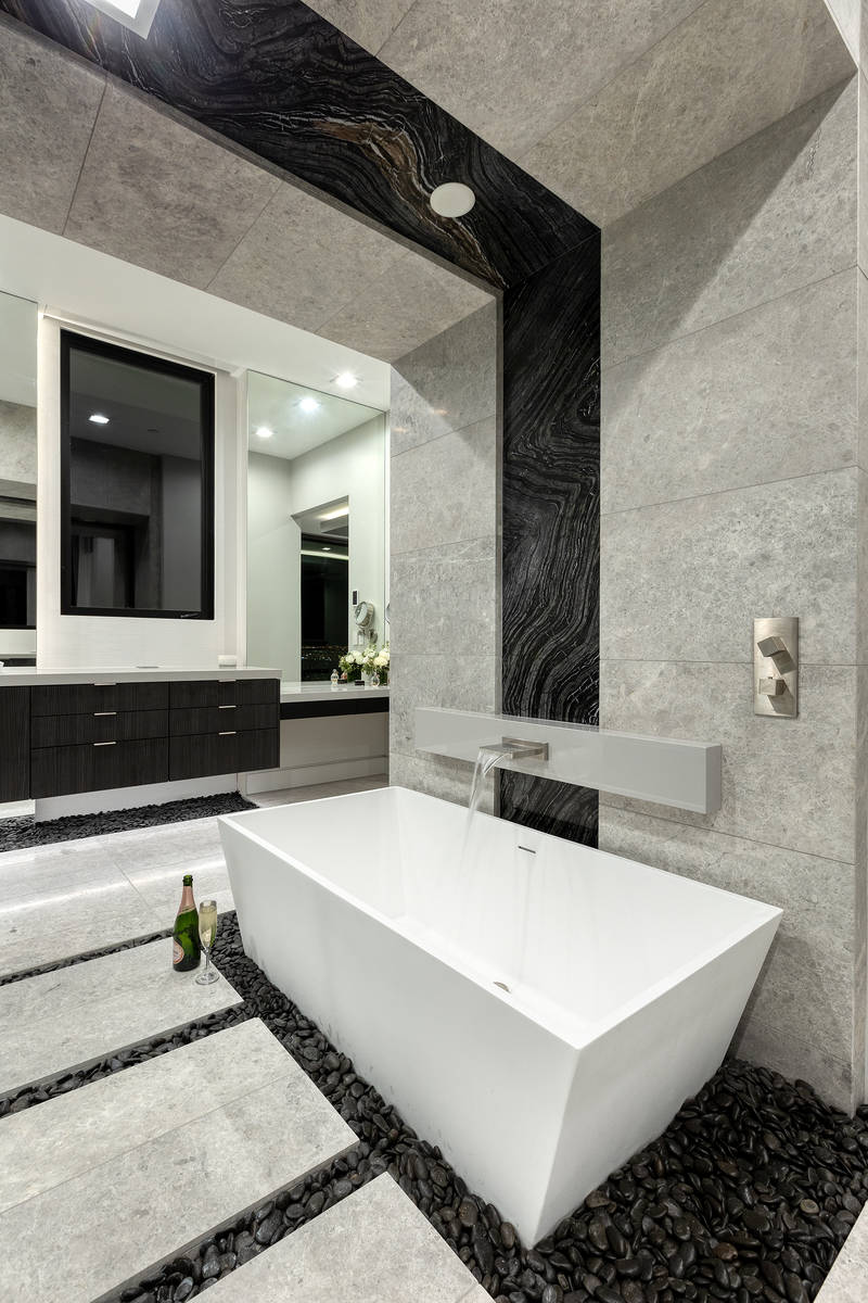 The master bath has a soaking tub. (Synergy Sotheby’s International Realty)