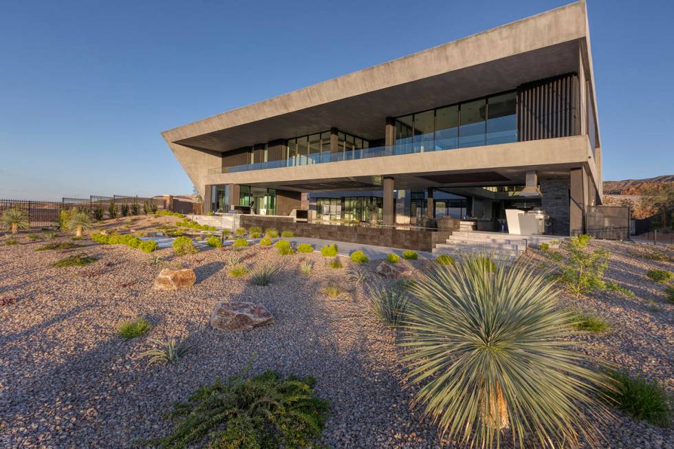 The home has desert landscaping. (Synergy Sotheby’s International Realty)