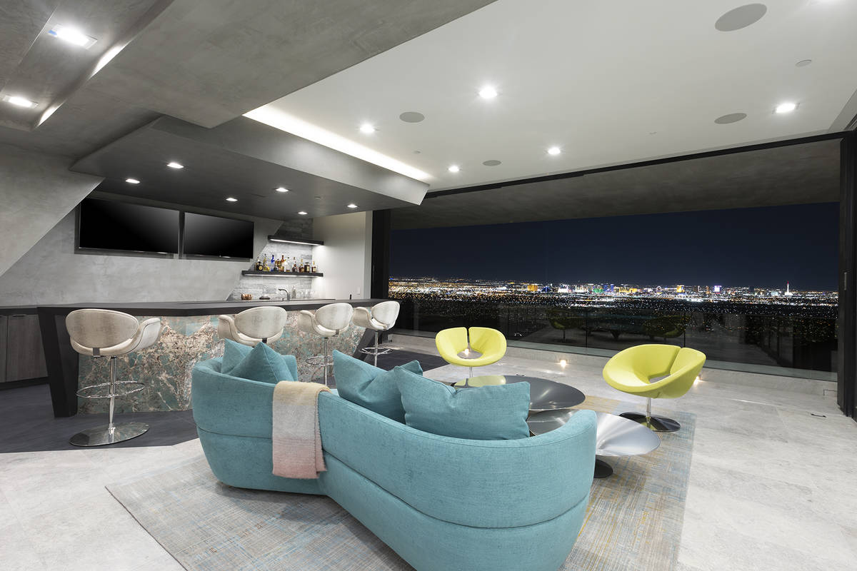 The color palette for the upper bar area reflects the neon colors of the Strip. Green couches a ...