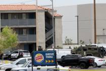Las Vegas police work a barricade situation at the Highland Inn Motel on Dean Martin Drive nort ...