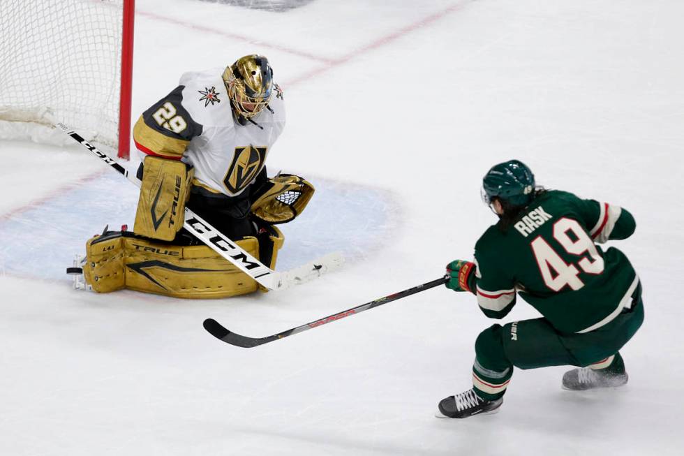 Vegas Golden Knights goaltender Marc-Andre Fleury (29) stops a shot by Minnesota Wild center Vi ...