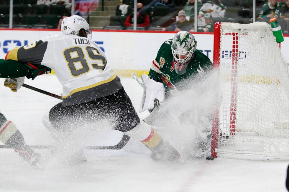 Minnesota Wild goaltender Cam Talbot (33) stops a shot by Vegas Golden Knights right wing Alex ...