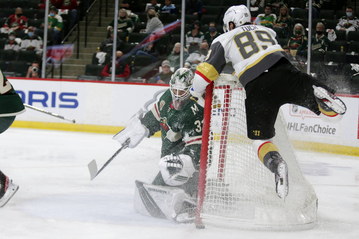 Minnesota Wild goaltender Cam Talbot (33) stops a shot by Vegas Golden Knights right wing Alex ...