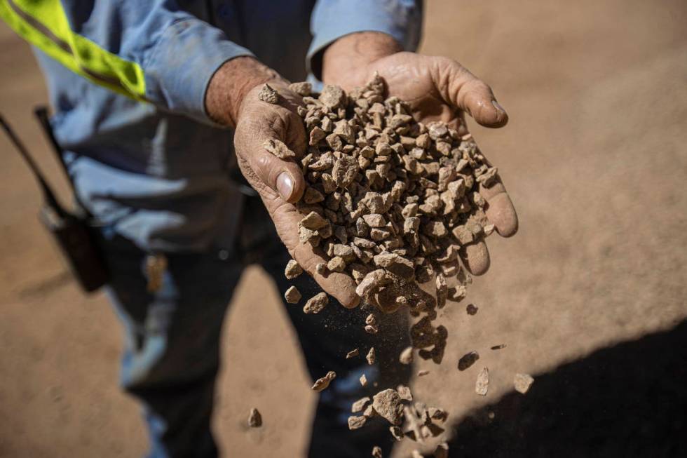 Robby Ruesch, manager of mining and delivery for Las Vegas-based company MP Materials, inspects ...