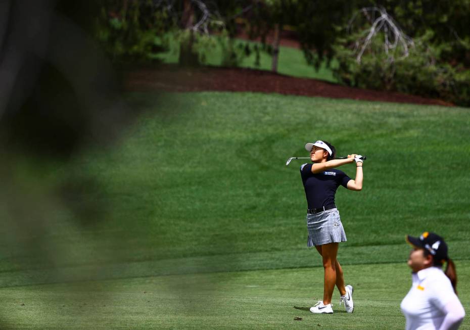 Jennifer Chang hits a fairway shot at the 12th hole during the first round of the Bank of Hope ...
