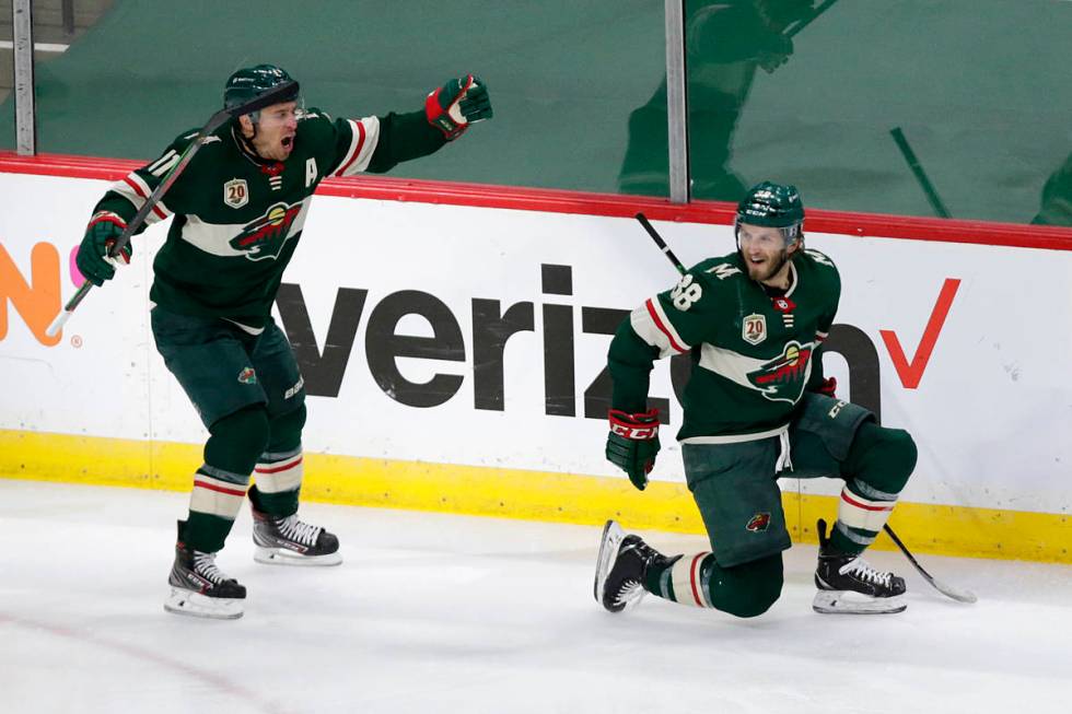 Minnesota Wild right wing Ryan Hartman (38) celebrates his goal against the Vegas Golden Knight ...