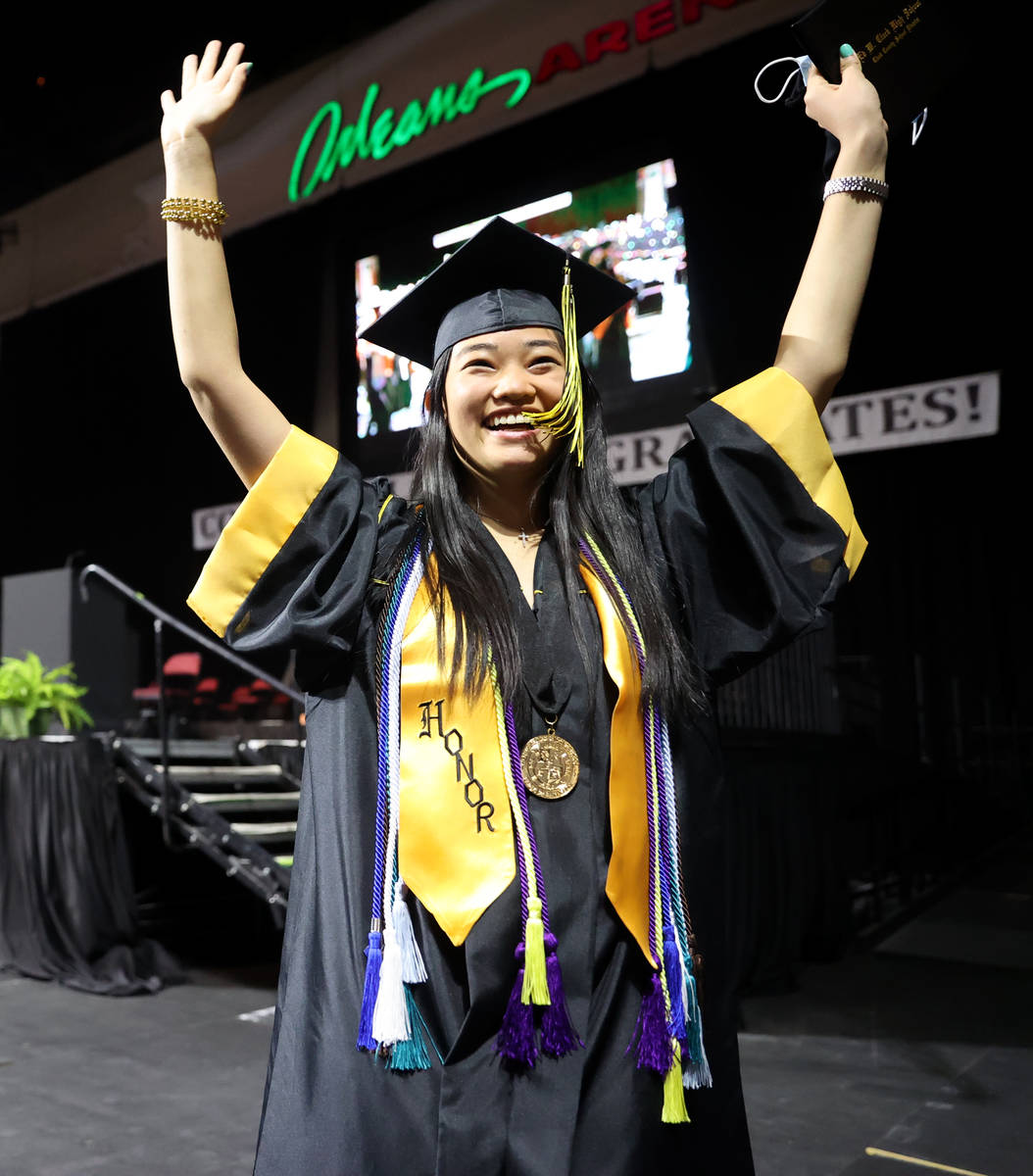 Clark High School graduate Sydney Lin waves to her family after a graduation ceremony at the Or ...