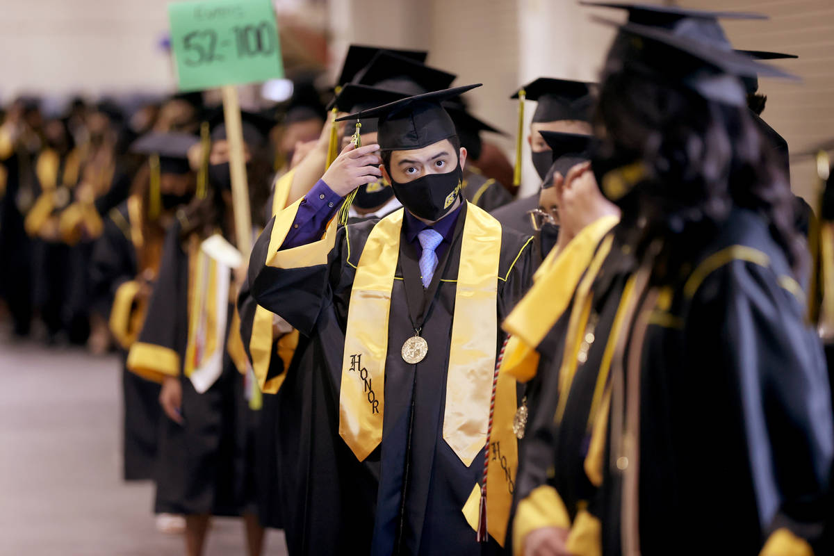 Clark High School student Jeremy Besitula prepares for his graduation ceremony at the Orleans A ...