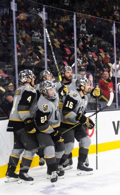 Henderson Silver Knights defensemen Jimmy Schuldt (4), Henderson Silver Knights left wing Danny ...