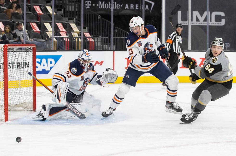 Henderson Silver Knights center Ben Jones (64) has his shot blocked by Bakersfield Condors defe ...