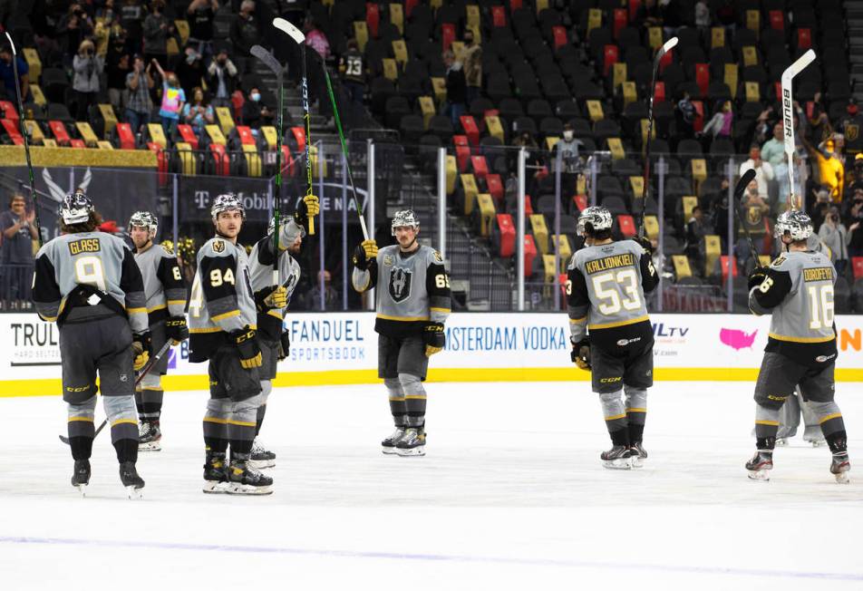 Henderson Silver Knights players salute the crowd after beating the Bakersfield Condors 6-3 dur ...