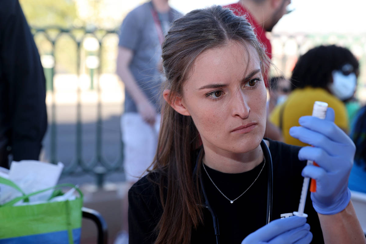 Touro University Physician Assistant student Megan Hickey prepares COVID-19 vaccines at the Wel ...