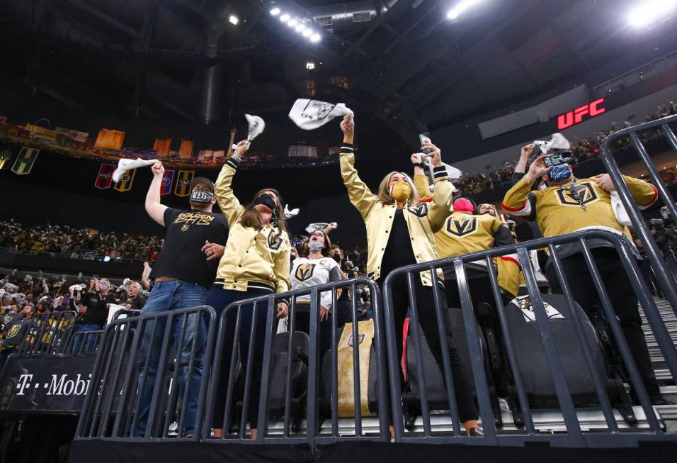 Golden Knights fans cheer before the start of Game 5 of a first-round NHL hockey playoff series ...