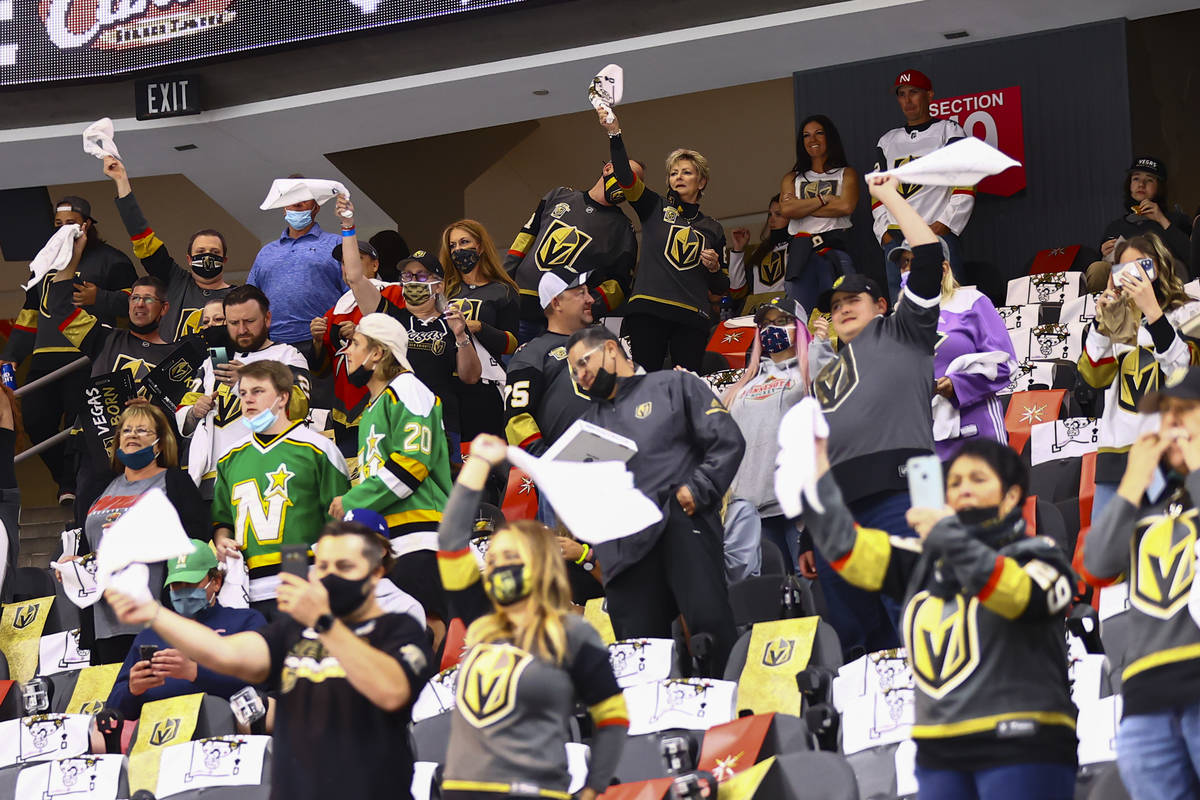 Golden Knights fans cheer before the start of Game 5 of a first-round NHL hockey playoff series ...