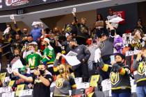Golden Knights fans cheer before the start of Game 5 of a first-round NHL hockey playoff series ...