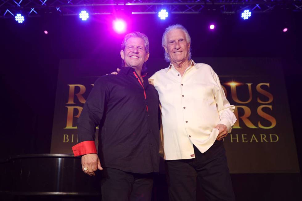 Bucky Heard, left, and Bill Medley of the Righteous Brothers pose for a photo after participati ...