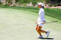 Danielle Kang reacts after a putt shot narrowly missed the 13th hole during the second round of ...