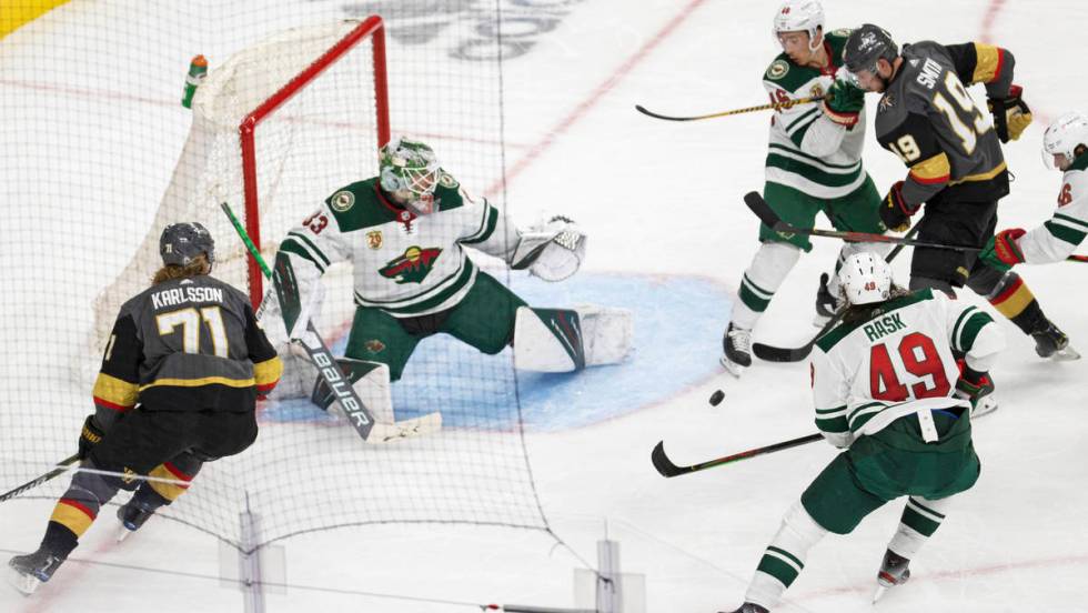 Minnesota Wild goaltender Cam Talbot (33) makes a save against Vegas Golden Knights right wing ...