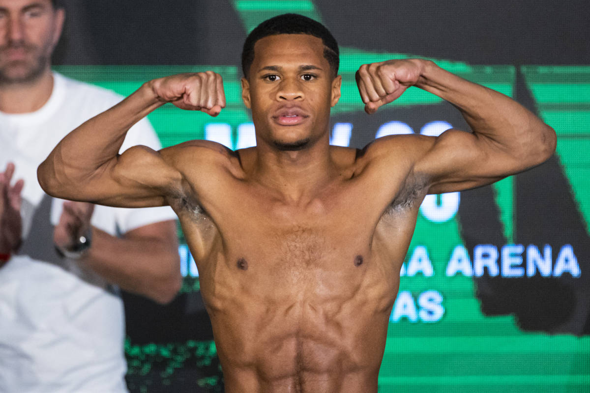 Devin Haney stands on the scale during a weigh-in Friday, May 28, 2021, in Las Vegas. Haney is ...