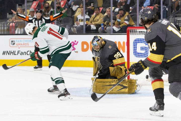 Minnesota Wild left wing Zach Parise (11) scores against Vegas Golden Knights goaltender Marc-A ...